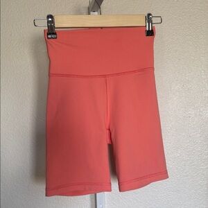 Aritzia TNA High-Waist Coral Bike Shorts 7”